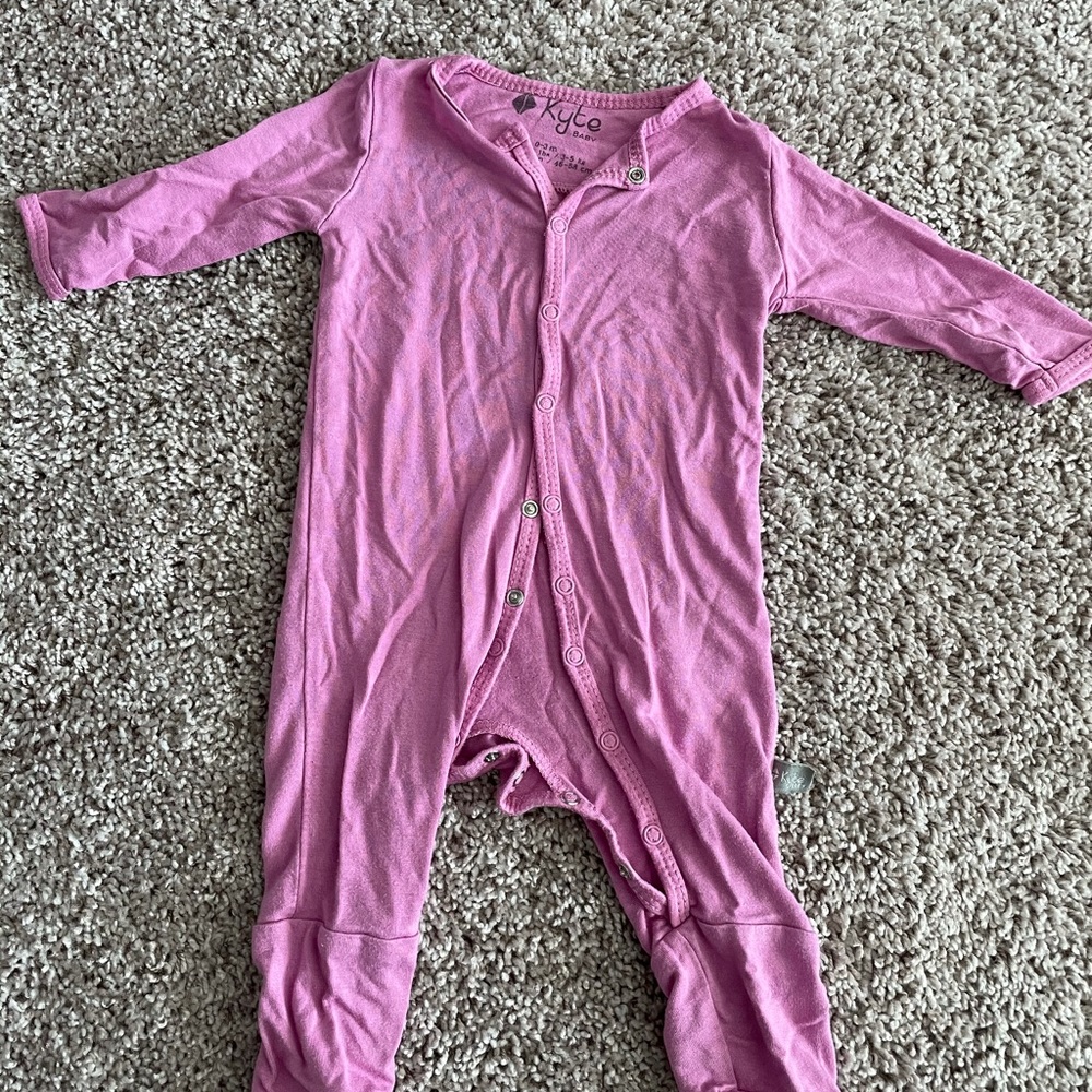 Kyte footless onesie in purple with snap closure